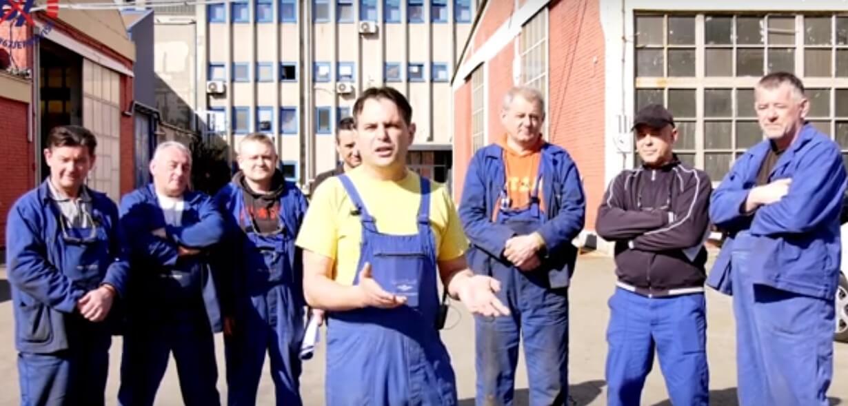 Radnici u radnim odijelima