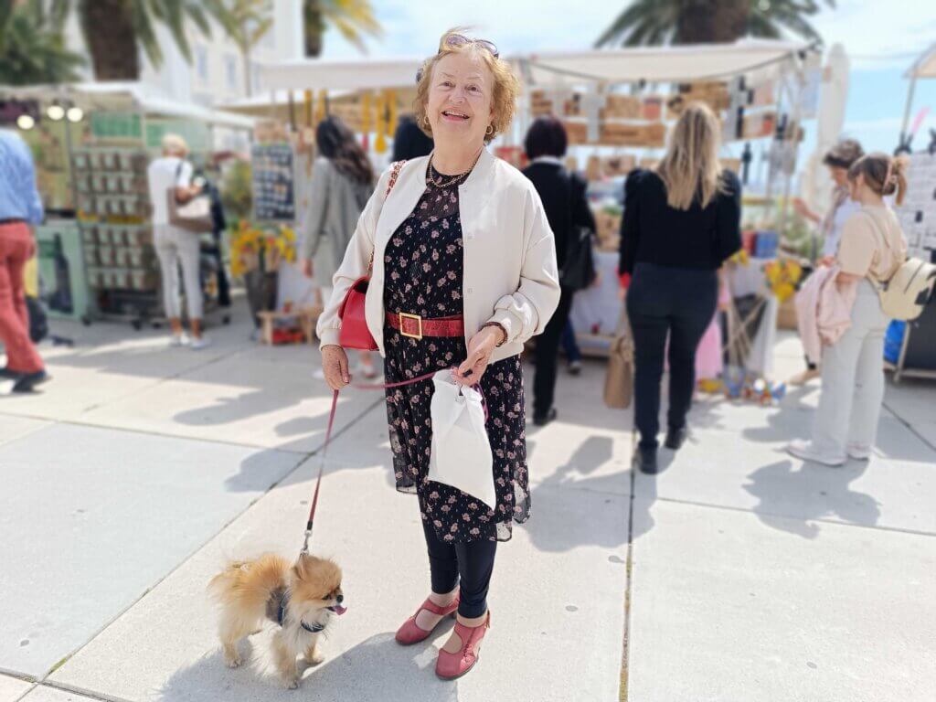 Splitska umirovljenica Merica s psom na proslavi Dana svetog Dujma.
